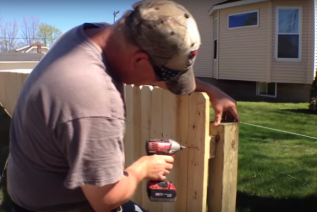 installing wooden fence